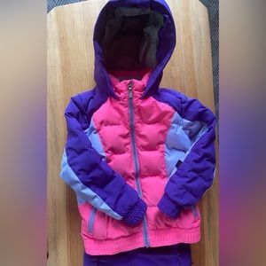 Spyder snowsuit. Size 4T. Adjustable pants.  Zippers work well.  Very warm!